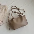 Chic dark beige minimalist tote bag with side knot detail and adjustable crossbody strap - Khaki