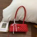 Detail of red vintage polka dot bag with white lace ribbon and heart pendant decoration - Red (No Pendant)