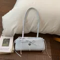 Detailed view of light blue polka dot shoulder bag with lace bow and heart charm - Blue Without Charm