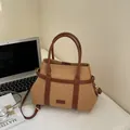 Khaki canvas and brown leather crossbody tote bag with adjustable shoulder strap - Khaki