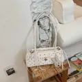 Chic polka dot shoulder bag with bow detail and cute plush dog pendant charm - White With Pendant
