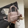 Sac polochon rose décontracté avec détail de nœud et charm de lapin en peluche - Avec Pendentif / Rose