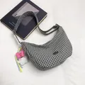 Chic black and white checkered canvas tote bag with a cute plush bunny charm - Black