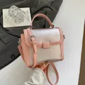 Minimalist pink and silver PU leather shoulder bag with metallic flap and top handle - Pink
