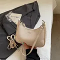 Elegant cream textured leather underarm bag in French minimalist style for women - Off White