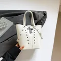 Punk style white bucket bag with gothic silver cross and rivet details on leather - White
