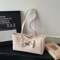 Borsa tote in tessuto crema con grande fiocco e chiusura a farfalla in metallo - Bianco Sporco