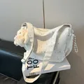 White star printed tote bag with plush bunny charm and wide shoulder strap - White With Pendant