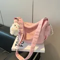 Pink canvas tote bag with silver star prints and a plush rabbit charm with pearl bow - Pink With Pendant