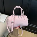 Pink Boston style cylinder handbag in glossy leather with adjustable shoulder straps - No Pendant / Pink