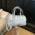 Light blue retro cylindrical bowling bag with silver hardware and adjustable strap - No Pendant / Blue