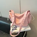 Pink tote bag with silver star print and stylish black-and-white rope handle detail - Pink Without Pendant