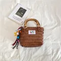 Brown woven handbag with natural bamboo handle and colorful beaded tassel accessories - S / With Pendant / Brown