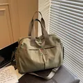 Waterproof large capacity travel duffel bag with shoulder strap and front zipper pockets - Green