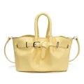 Bright yellow patent leather bucket bag with dual handles and metal buckle strap - Yellow