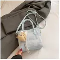 Light blue plaid crossbody bag with leather handles and cute plush bear charm - With Charm / Blue