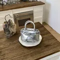 Silver metallic handbag with bow detail and star charm in a modern minimalist style - Silver (Without Charm)