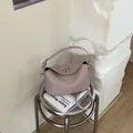 Dusty pink litchi grain leather crossbody bag with silver rotating metal buckle detail - No Pendant / Pink