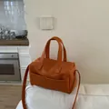 Orange lychee leather tote bag with double handles and adjustable crossbody shoulder strap - No Pendant / Orange
