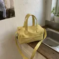 Light yellow lychee pattern leather Boston bag with top handles and crossbody strap - No Pendant / Yellow