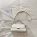 Elegante borsa a mano in pelle bianco crema con manico e tracolla regolabile - Bianco Sporco