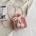 Mini handgefertigte rosa Perlen-Umhängetasche mit weißer Seidenschleife und Perlenriemen - Rosa