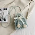 Mini Perlenhandtasche in Hellblau mit Satinschleife und Perlen-Schultergurt - Hellblau