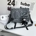 Dark grey nylon messenger bag with white claw pattern and monkey plush pendant accessory - With Gorilla Pendant / Gray