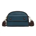 Teal grain leather shell bag with brown contrast flap and wide shoulder strap - Blue