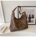 Detailed macro of dark brown vintage shoulder bag featuring elegant marble textured leather - No Pendant / Coffee