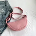 Pink waterproof nylon crescent crossbody bag with adjustable wide shoulder strap - Pink