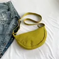 Waterproof nylon half-moon crossbody bag in bright yellow with adjustable strap - Yellow