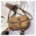 Vintage brown lychee grain leather crossbody bag with contrast stitching and gold buckle - Milk Tea