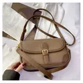 Vintage brown pebbled leather shoulder bag with gold metal buckle and adjustable strap - Brown