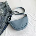 Waterproof nylon crescent crossbody bag in dusty blue with adjustable shoulder strap - Light Blue