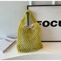 Detail of lime green woven tote bag featuring a practical beige drawstring inner pouch - Yellow