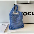 Blue woven crochet tote bag with mesh design and drawstring linen inner pouch - Blue