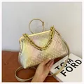 Iridescent gradient doctor bag with a large gold ring handle and chunky chain detail - Gold