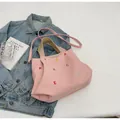 Pink canvas tote bag with colorful embroidered letters and adjustable shoulder strap - Pink