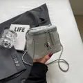 Mini light grey bucket bag with silver floral texture and camellia charm strap - Silver