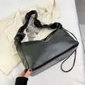 Minimalist black pleated cloud shoulder bag in sleek PU leather for women - Black