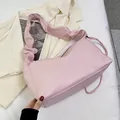 Minimalist light pink pleated cloud bag with ruffled shoulder strap in high-gloss PU leather - Pink