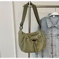 Olive green pleated crossbody dumpling bag with adjustable wide nylon strap for women - Green