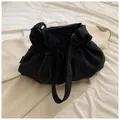Minimalist black nylon drawstring bucket bag with adjustable wide shoulder strap for casual wear - No Pendant / Black