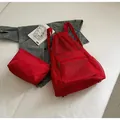 Red breathable mesh drawstring backpack set with matching small storage pouch - Backpack and Pouch Set / Red