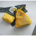 Yellow mesh drawstring backpack with matching storage pouch for fitness and beach trips - Backpack and Pouch Set / Yellow