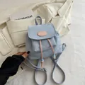 Chic light blue mini backpack with pink drawstring detail and branded leather patch - No Pendant / Blue