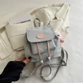 Chic gray frosted mini backpack for women featuring pink drawstring and plush charm - With Pendant / Gray