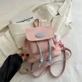 Chic light pink mini backpack with blue drawstring and plush charm accessory - With Pendant / Pink
