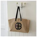 Sac fourre-tout en paille tissée avec lettrage HB noir et anses en cuir - Style Épaule Simple / Noir